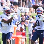 Jul 28, 2025; Foxborough, MA, USA; New England Patriots wide receiver Kayshon Boutte (9) does a drill with wide receiver Stefon Diggs (8) during training camp at Gillette Stadium. Mandatory Credit: Eric Canha-Imagn Images