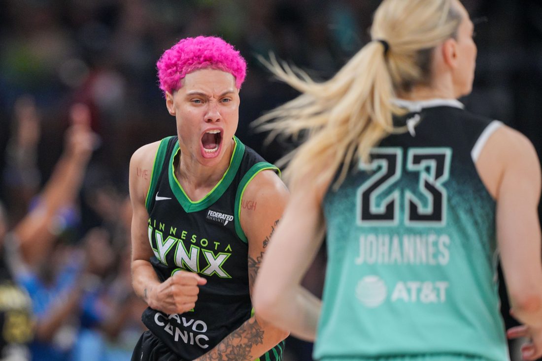 Jul 30, 2025; Minneapolis, Minnesota, USA; Minnesota Lynx guard Natisha Hiedeman (2) celebrates against the New York Liberty guard Marine Johannes (23) in the fourth quarter at Target Center. Mandatory Credit: Brad Rempel-Imagn Images
