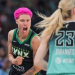 Jul 30, 2025; Minneapolis, Minnesota, USA; Minnesota Lynx guard Natisha Hiedeman (2) celebrates against the New York Liberty guard Marine Johannes (23) in the fourth quarter at Target Center. Mandatory Credit: Brad Rempel-Imagn Images