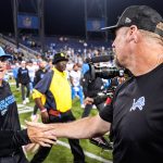 LA Chargers head coach Jim Harbaugh shakes hands with Detroit Lions head coach Dan Campbell after 34-7 win over the Lions at the Hall of Fame Game at Tom Benson Hall of Fame Stadium in Canton, Ohio on Thursday, July 31, 2025.