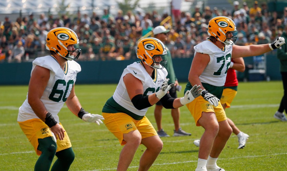 Green Bay Packers offensive linemen Tyler Cooper (60), JJ Lippe (61) and Brant Banks (72) run through a drill during practice on Friday, August 1, 2025, at Ray Nitschke Field in Ashwaubenon, Wis.
