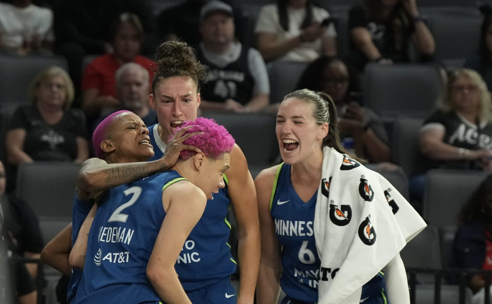 Aug 2, 2025; Las Vegas, Nevada, USA; Minnesota Lynx guard Courtney Williams (10), forward Jessica Shepard (15) and forward Bridget Carleton (6) celebrates a blocked shot by guard Natisha Hiedeman (2) against the Las Vegas Aces during the fourth quarter of their game at Michelob Ultra Arena.