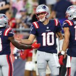 Aug 8, 2025; Foxborough, Massachusetts, USA; New England Patriots quarterback Drake Maye (10) celebrates after scoring a touchdown during the first half against the Washington Commanders at Gillette Stadium. Mandatory Credit: Paul Rutherford-Imagn Images