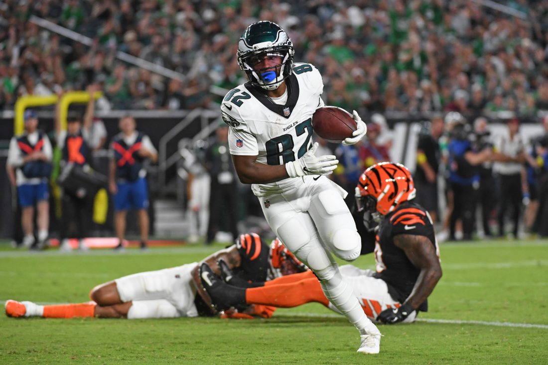Aug 7, 2025; Philadelphia, Pennsylvania, USA; Philadelphia Eagles wide receiver Ainias Smith (82) scores a touchdown against the Cincinnati Bengals at Lincoln Financial Field. Mandatory Credit: Eric Hartline-Imagn Images
