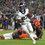 Aug 7, 2025; Philadelphia, Pennsylvania, USA; Philadelphia Eagles wide receiver Ainias Smith (82) scores a touchdown against the Cincinnati Bengals at Lincoln Financial Field. Mandatory Credit: Eric Hartline-Imagn Images