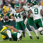 New York Jets defensive tackle Jay Tufele (78) sacks Green Bay Packers quarterback Jordan Love (10) during their preseason game on Saturday, Aug. 9, 2025, at Lambeau Field in Green Bay, Wisconsin.