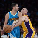 Apr 9, 2013; Los Angeles, CA, USA; Los Angeles Lakers point guard Steve Blake (5) guards New Orleans Hornets point guard Greivis Vasquez (21) in the first half at the Staples Center. Mandatory Credit: Jayne Kamin-Oncea-USA TODAY Sports