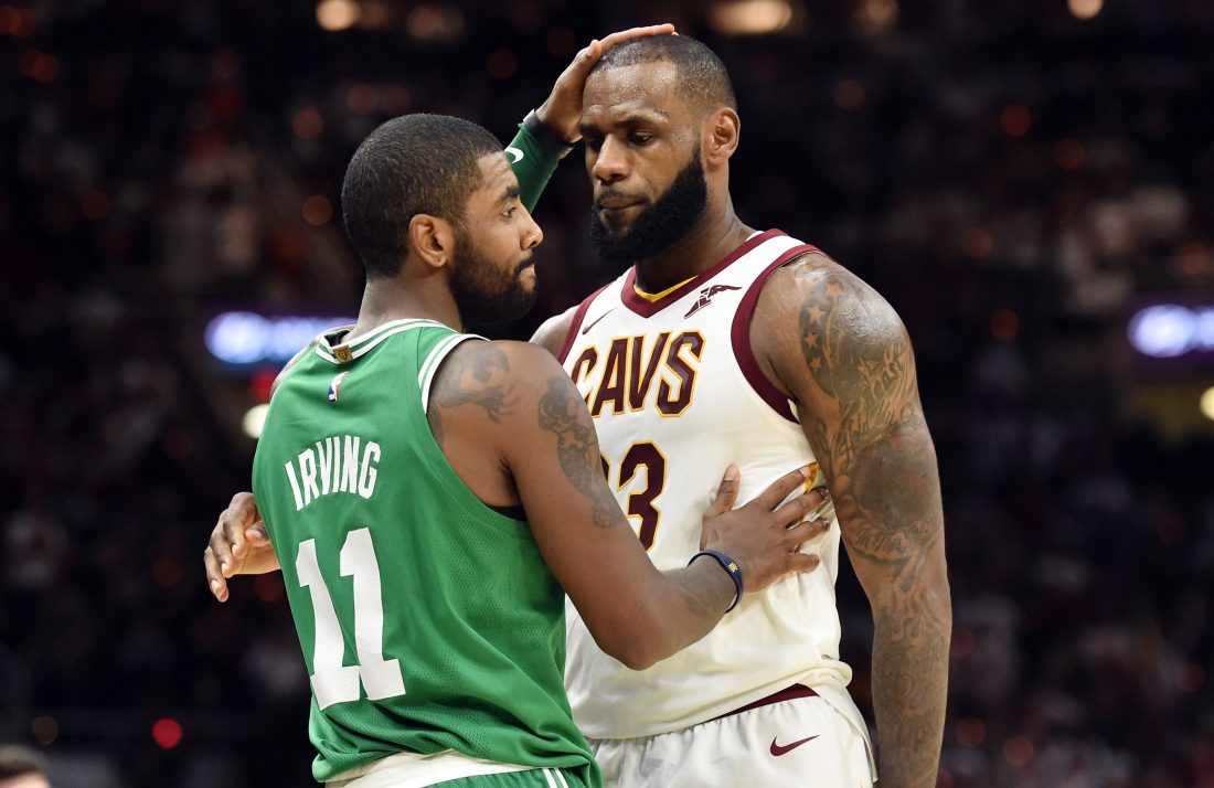 Oct 17, 2017; Cleveland, OH, USA; Cleveland Cavaliers forward LeBron James (23) and Boston Celtics guard Kyrie Irving (11) meet after the Cavs beat the Celtics 102-99 at Quicken Loans Arena.