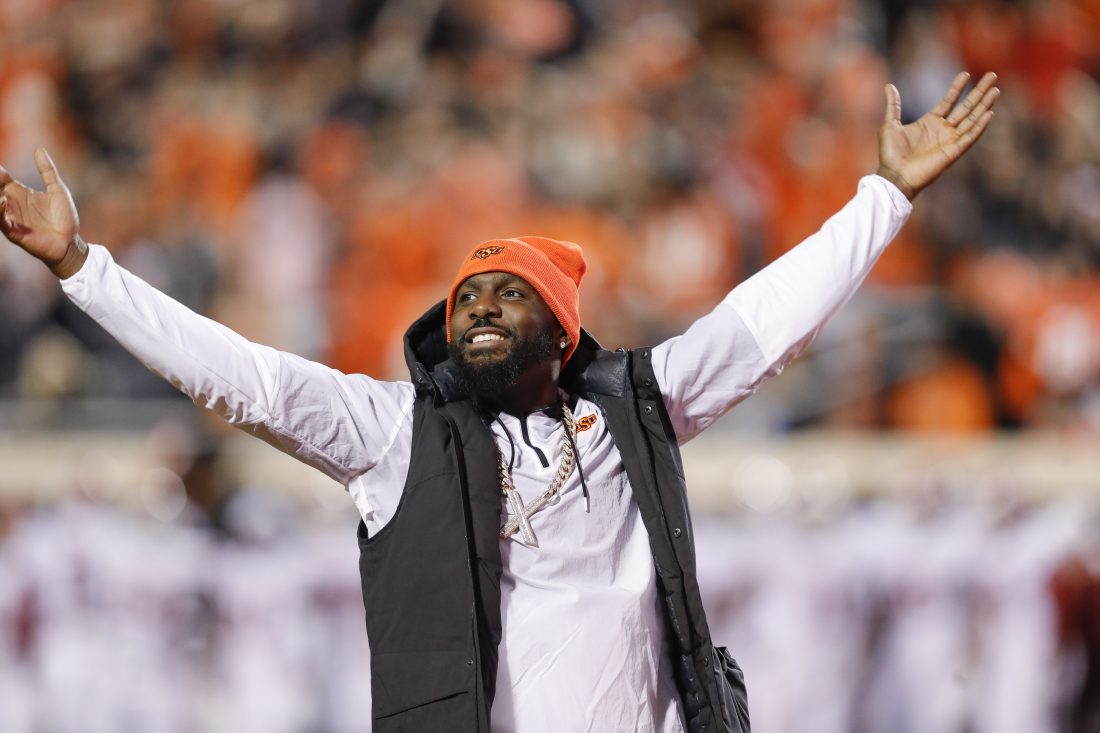 Nov 27, 2021; Stillwater, Oklahoma, USA; Oklahoma State Cowboys former receiver Dez Bryant waves to the fans during the first half of a game against the Oklahoma Sooners at Boone Pickens Stadium.