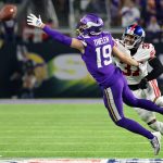 Jan 15, 2023; Minneapolis, Minnesota, USA; Minnesota Vikings wide receiver Adam Thielen (19) is unable to catch a pass while defended by New York Giants cornerback Fabian Moreau (37) during the fourth quarter during a wild card game at U.S. Bank Stadium. Mandatory Credit: Matt Krohn-USA TODAY Sports