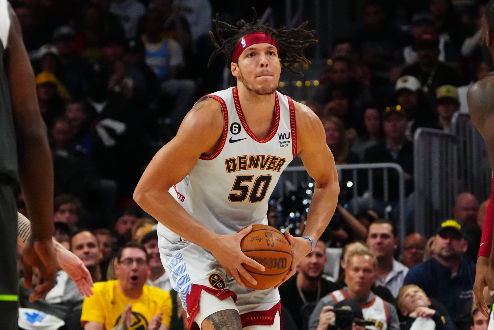 Apr 25, 2023; Denver, Colorado, USA; Denver Nuggets forward Aaron Gordon (50) prepares to launch a full court shot in the first quarter against the Minnesota Timberwolves in game five of the 2023 NBA Playoffs at Ball Arena. Mandatory Credit: Ron Chenoy-USA TODAY Sports