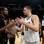Dec 1, 2023; Phoenix, Arizona, USA; Denver Nuggets center Nikola Jokic (right) greets Phoenix Suns forward Kevin Durant following the game at Footprint Center. Mandatory Credit: Mark J. Rebilas-USA TODAY Sports