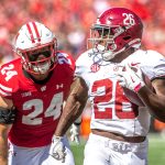 Alabama running back Jam Miller (26) runs a touchdown from Wisconsin Hunter Wohler during the game at Camp Randall Stadium in Madison, Wis. on Saturday, September 14, 2024.