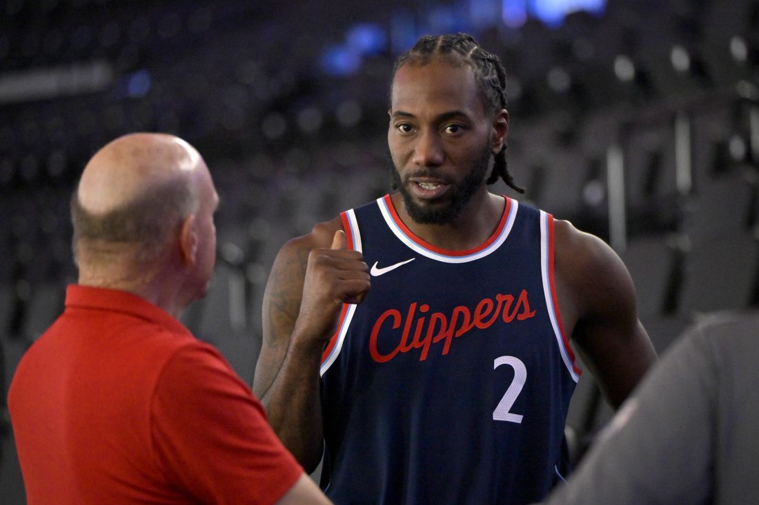 Sep 30, 2024; Inglewood, CA, USA; Los Angeles Clippers forward Kawhi Leonard (2) talks with team owner Steve Ballmer during media day at Intuit Dome. Mandatory Credit: Jayne Kamin-Oncea-Imagn Images