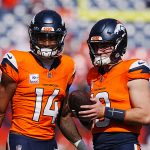 Oct 13, 2024; Denver, Colorado, USA; Denver Broncos wide receiver Courtland Sutton (14) and quarterback Bo Nix (10) warm up before the game against the Los Angeles Chargers at Empower Field at Mile High. Mandatory Credit: Ron Chenoy-Imagn Images