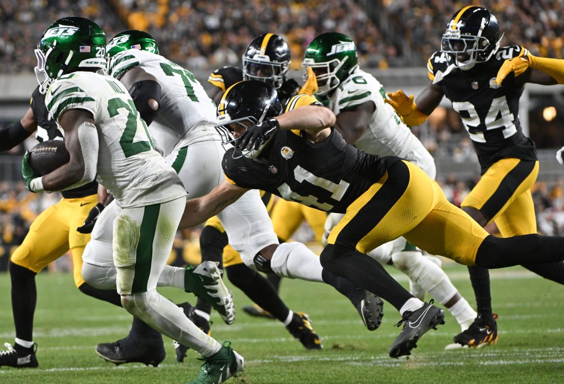 Oct 20, 2024; Pittsburgh, Pennsylvania, USA; Pittsburgh Steelers linebacker Payton Wilson (41) chases New York Jets running back Breece Hall (20) during the third quarter at Acrisure Stadium. Mandatory Credit: Barry Reeger-Imagn Images