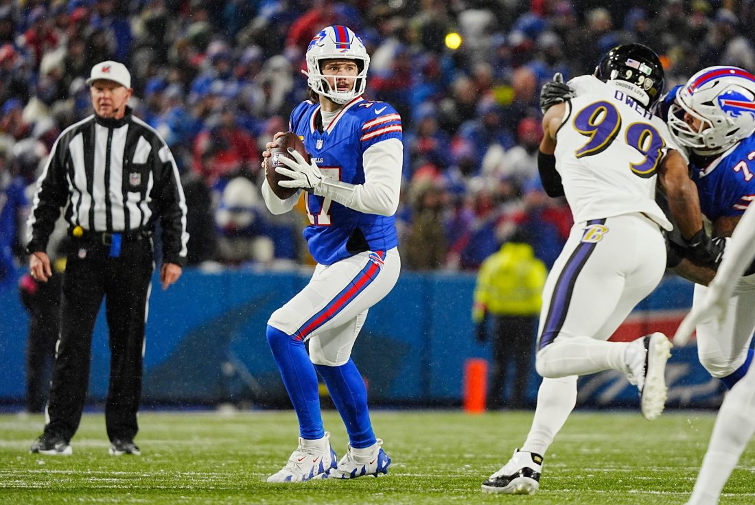 Buffalo Bills quarterback Josh Allen gets ready to throw a pass during first half action at the Buffalo Bills divisional game against the Baltimore Ravens at Highmark Stadium in Orchard Park on Jan. 19, 2025.