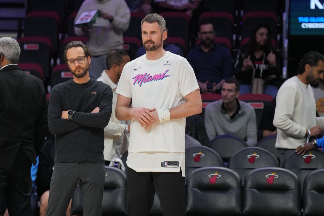 Jan 29, 2025; Miami, Florida, USA; Miami Heat forward Kevin Love (42) looks on during warm-ups before the game against the Cleveland Cavaliers at Kaseya Center. Mandatory Credit: Jim Rassol-Imagn Images