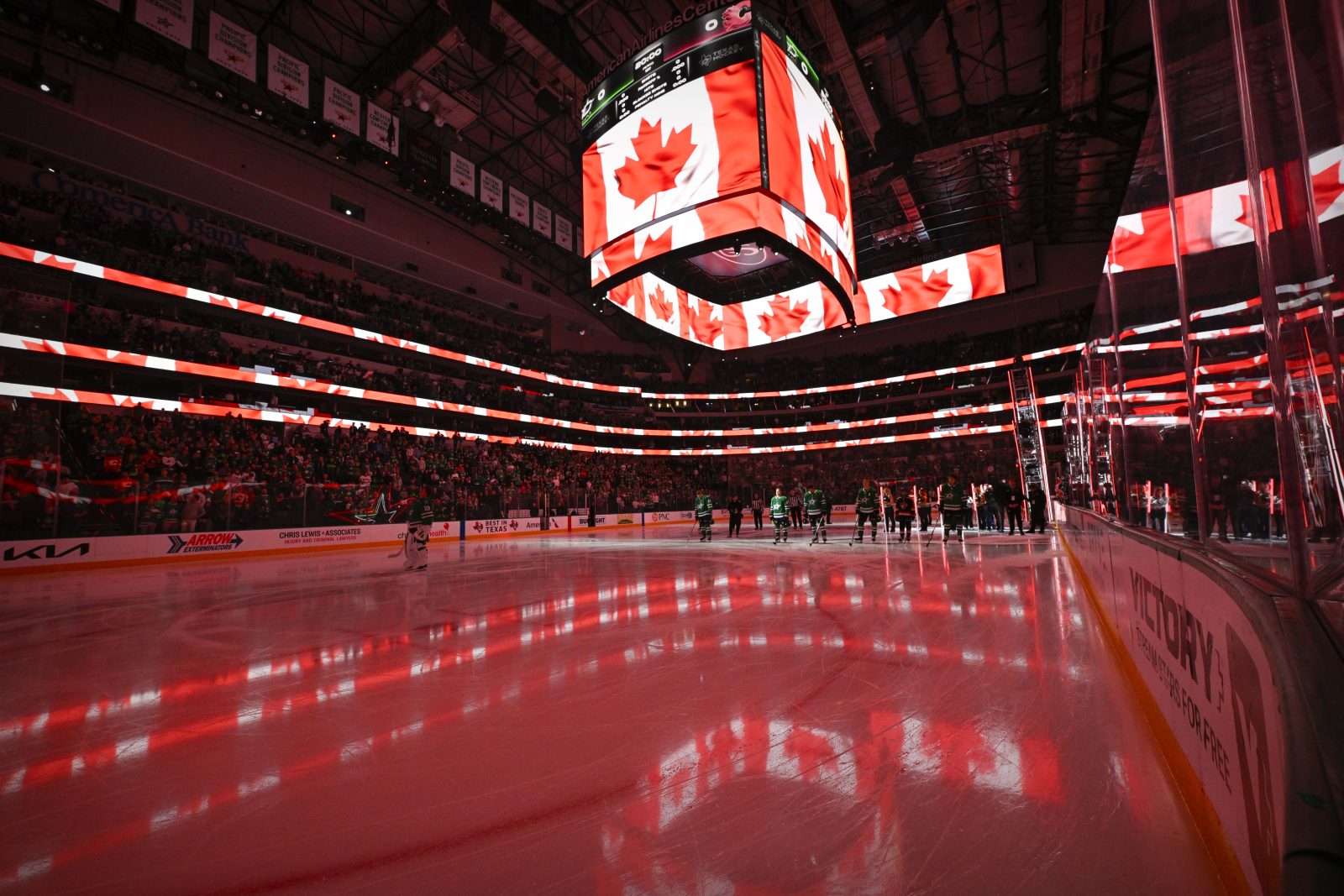 Mar 6, 2025; Dallas, Texas, USA; A view of the arena and the flag of Canada during the playing of the Canadian national anthem before the game between the Dallas Stars and the Calgary Flames at the American Airlines Center.