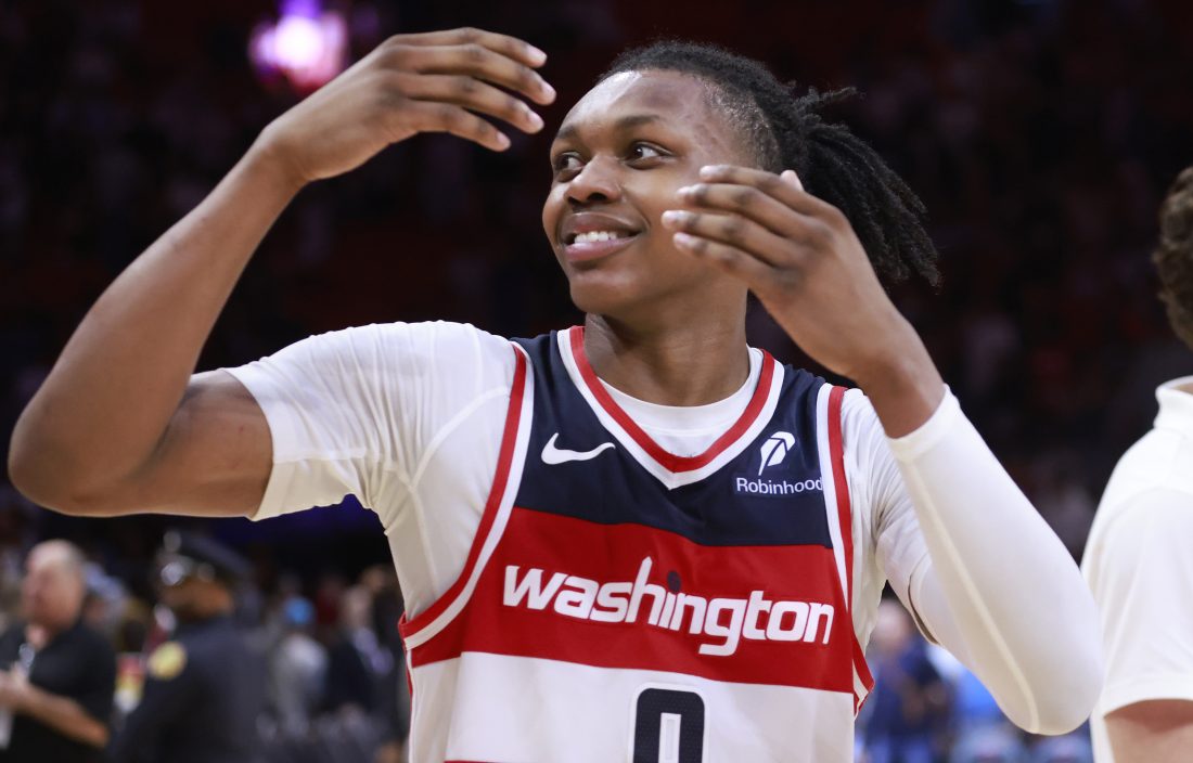 Apr 13, 2025; Miami, Florida, USA; Washington Wizards guard Bub Carrington (8) celebrates the Wizards win against the Miami Heat at Kaseya Center.