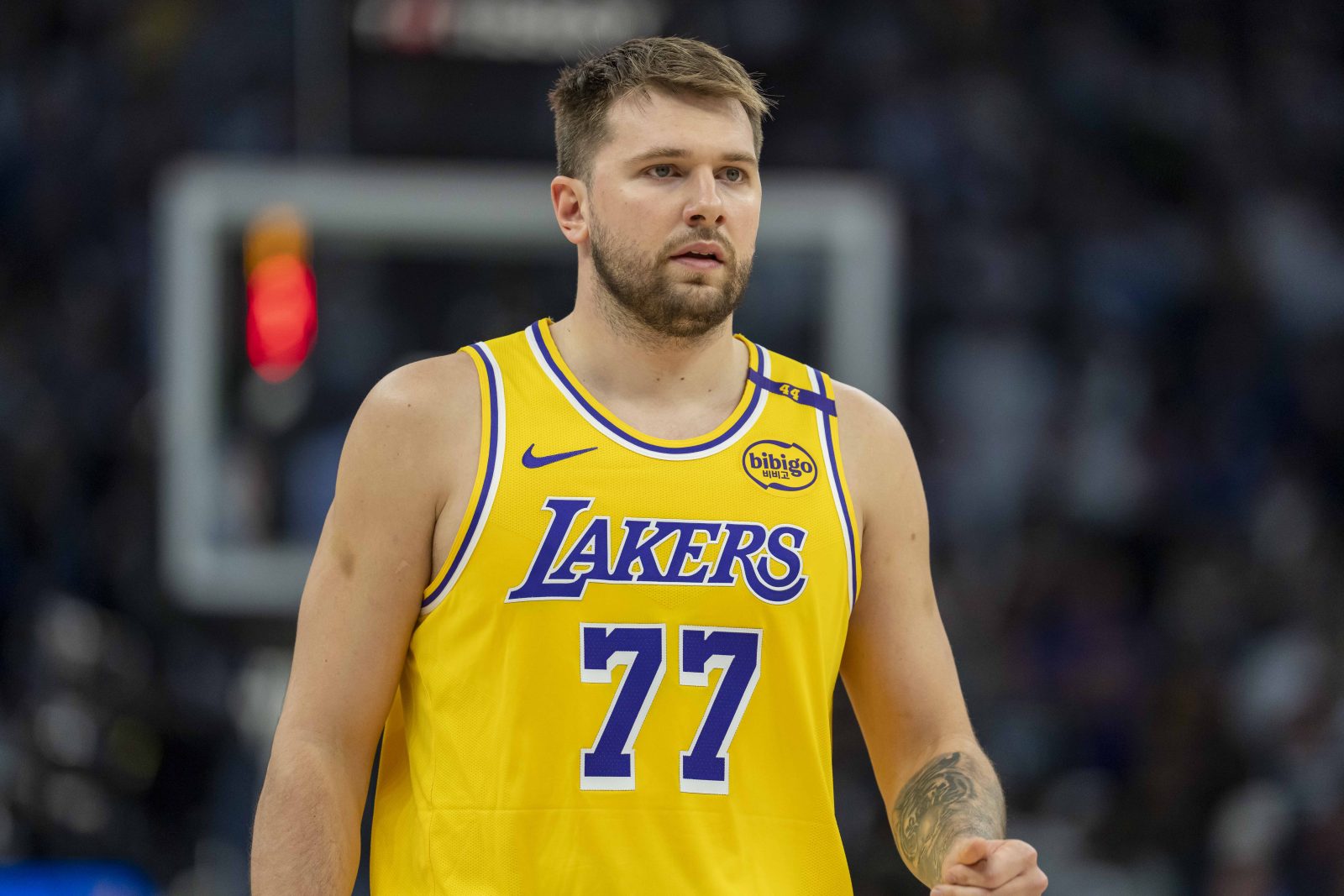 Apr 25, 2025; Minneapolis, Minnesota, USA; Los Angeles Lakers guard Luka Doncic (77) looks on against the Minnesota Timberwolves in the first half during game three of first round for the 2024 NBA Playoffs at Target Center.