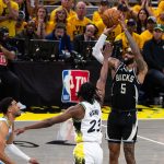 Apr 29, 2025; Indianapolis, Indiana, USA; Milwaukee Bucks guard Gary Trent Jr. (5) shoots the ball while Indiana Pacers forward Aaron Nesmith (23) defends during game five of the first round for the 2024 NBA Playoffs at Gainbridge Fieldhouse.
