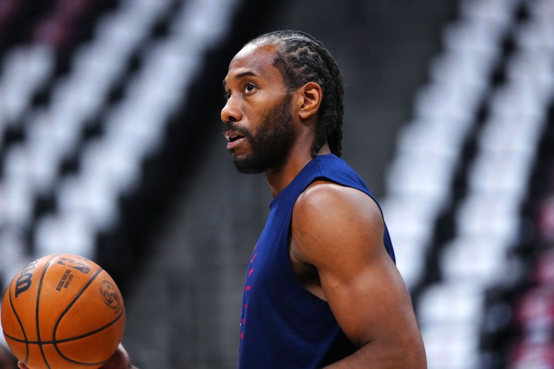 May 3, 2025; Denver, Colorado, USA; LA Clippers forward Kawhi Leonard (2) warms up before the game against the Denver Nuggets during game seven of first round for the 2025 NBA Playoffs at Ball Arena. Mandatory Credit: Ron Chenoy-Imagn Images