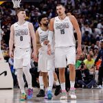 May 15, 2025; Denver, Colorado, USA; Denver Nuggets guard Jamal Murray (27) and center Nikola Jokic (15) and guard Christian Braun (0) in the fourth quarter against the Oklahoma City Thunder during game six of the second round for the 2025 NBA Playoffs at Ball Arena.