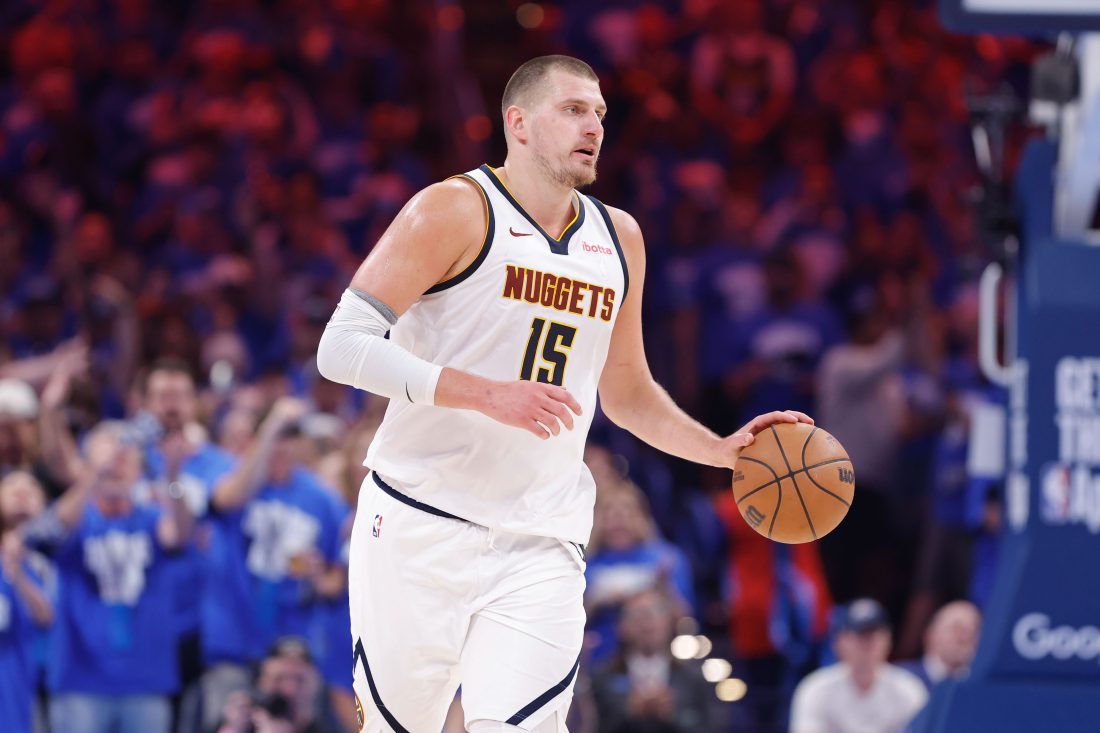 May 18, 2025; Oklahoma City, Oklahoma, USA; Denver Nuggets center Nikola Jokic (15) dribbles down the court against the Oklahoma City Thunder in the second quarter during game seven of the second round for the 2025 NBA Playoffs at Paycom Center.