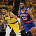 May 31, 2025; Indianapolis, Indiana, USA; New York Knicks forward Mikal Bridges (25) dribbles the ball defended by Indiana Pacers guard Tyrese Haliburton (0) in the third quarter during game six of the eastern conference finals for the 2025 NBA Playoffs at Gainbridge Fieldhouse. Mandatory Credit: Trevor Ruszkowski-Imagn Images