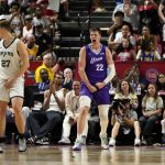 Jul 14, 2025; Las Vegas, NV, USA; Utah Jazz forward Kyle Filipowski (22) reacts after scoring against the San Antonio Spurs during overtime in a NBA basketball game at the Thomas & Mack Center. Mandatory Credit: Lucas Peltier-Imagn Images