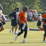 Jul 23, 2025; Lake Forest, IL, USA; Chicago Bears quarterbacks Austin Reed (16), Case Keenum (11) and Caleb Williams (18) warm up during training camp at Halas Hall. Mandatory Credit: Kamil Krzaczynski-Imagn Images