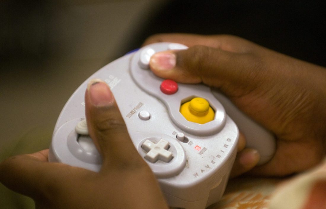 A contestant uses a video game controller in a Super Smash Brothers Nintendo Wii Tournament at the Manteca Branch Library in downtown Manteca on jul. 10. 2008.