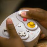 A contestant uses a video game controller in a Super Smash Brothers Nintendo Wii Tournament at the Manteca Branch Library in downtown Manteca on jul. 10. 2008.