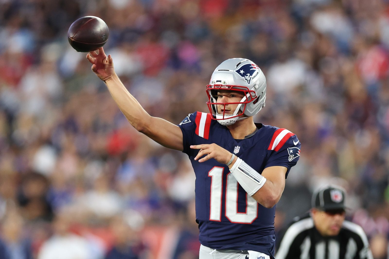 Aug 8, 2025; Foxborough, Massachusetts, USA; New England Patriots quarterback Drake Maye (10) passes the ball during the first half against the Washington Commanders at Gillette Stadium. Mandatory Credit: Paul Rutherford-Imagn Images