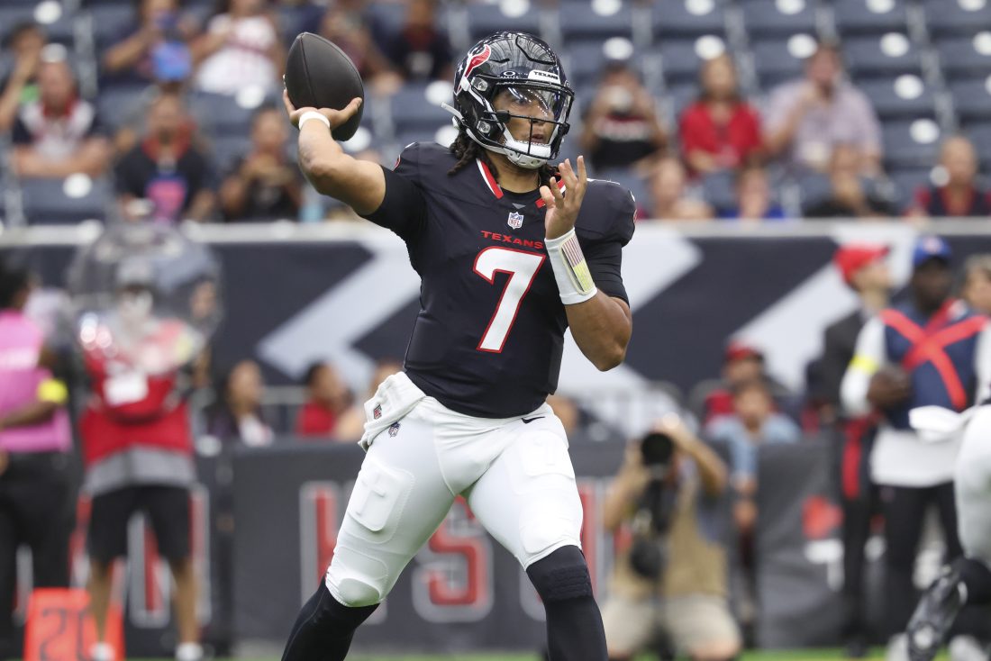 Aug 16, 2025; Houston, Texas, USA; Houston Texans quarterback C.J. Stroud (7) attempts a pass during the first quarter against the Carolina Panthers at NRG Stadium. Mandatory Credit: Troy Taormina-Imagn Images