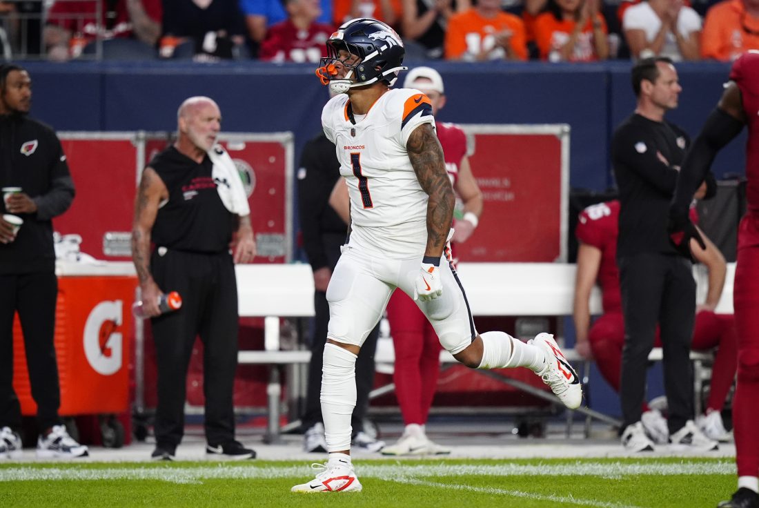 Aug 16, 2025; Denver, Colorado, USA; Denver Broncos tight end Evan Engram (1) following a reception in the first quarter against the Arizona Cardinals at Empower Field at Mile High. Mandatory Credit: Ron Chenoy-Imagn Images