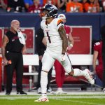 Aug 16, 2025; Denver, Colorado, USA; Denver Broncos tight end Evan Engram (1) following a reception in the first quarter against the Arizona Cardinals at Empower Field at Mile High. Mandatory Credit: Ron Chenoy-Imagn Images