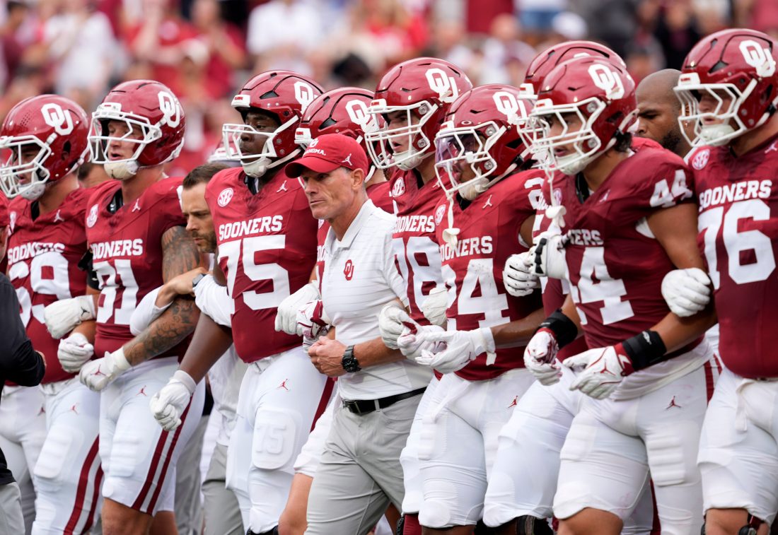 Oklahoma head coach Brent Venables walk with the team before the college football game between the University of Oklahoma Sooners and the Illinois State Redbirds at the Gaylord Family Oklahoma Memorial Stadium in Norman, Okla., Saturday, Aug. 30, 2025.
