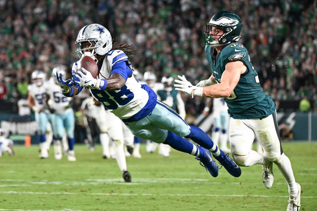 Sep 4, 2025; Philadelphia, Pennsylvania, USA; Dallas Cowboys wide receiver CeeDee Lamb (88) is unable to make a reception defended by Philadelphia Eagles cornerback Cooper DeJean (33) during the fourth quarter of the game at Lincoln Financial Field. Mandatory Credit: Eric Hartline-Imagn Images