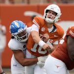 Sep 6, 2025; Austin, Texas, USA; Texas Longhorns quarterback Arch Manning (16) reacts after getting hit by San Jose State Spartans linebacker Taniela Latu (4) during the second half at Darrell K Royal-Texas Memorial Stadium. Mandatory Credit: Scott Wachter-Imagn Images