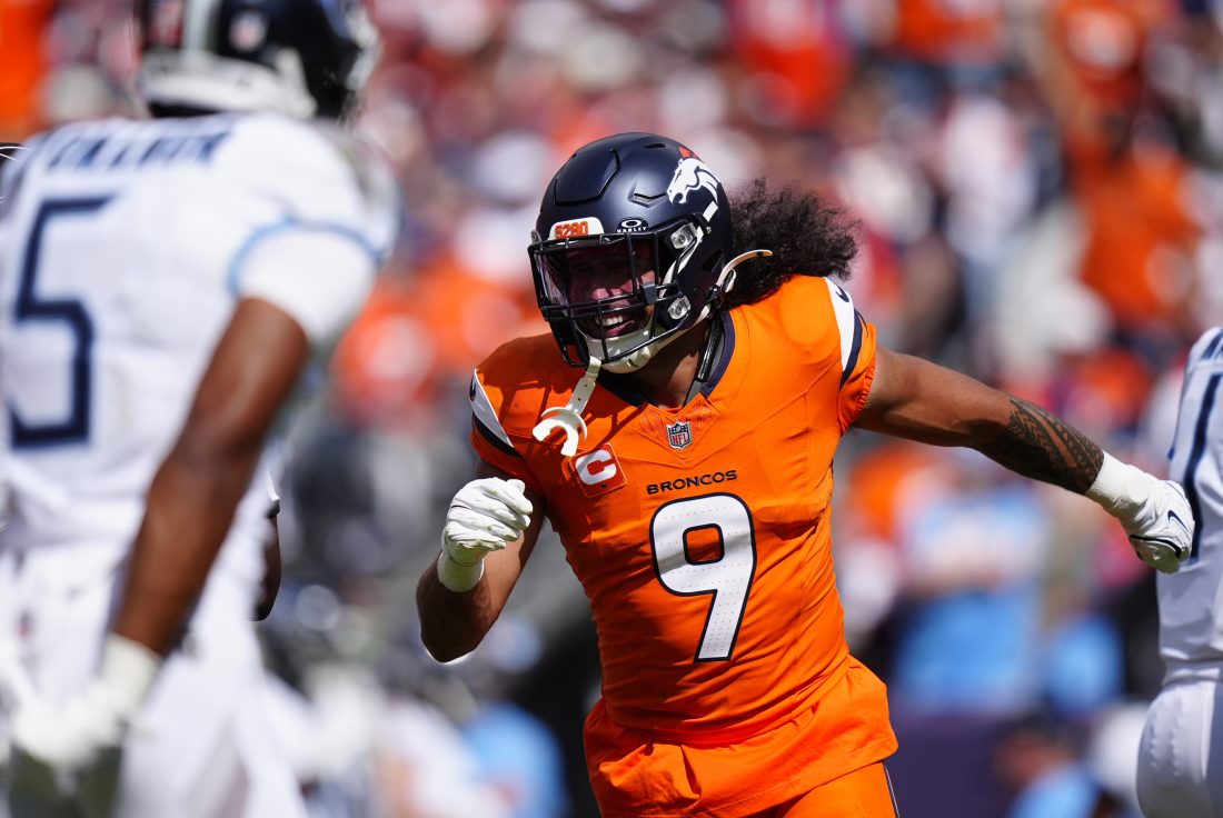 Sep 7, 2025; Denver, Colorado, USA;Denver Broncos safety Talanoa Hufanga (9) reacts against the Tennessee Titans in the first half at Empower Field at Mile High. Mandatory Credit: Ron Chenoy-Imagn Images