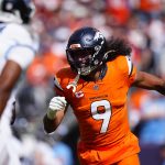 Sep 7, 2025; Denver, Colorado, USA;Denver Broncos safety Talanoa Hufanga (9) reacts against the Tennessee Titans in the first half at Empower Field at Mile High. Mandatory Credit: Ron Chenoy-Imagn Images