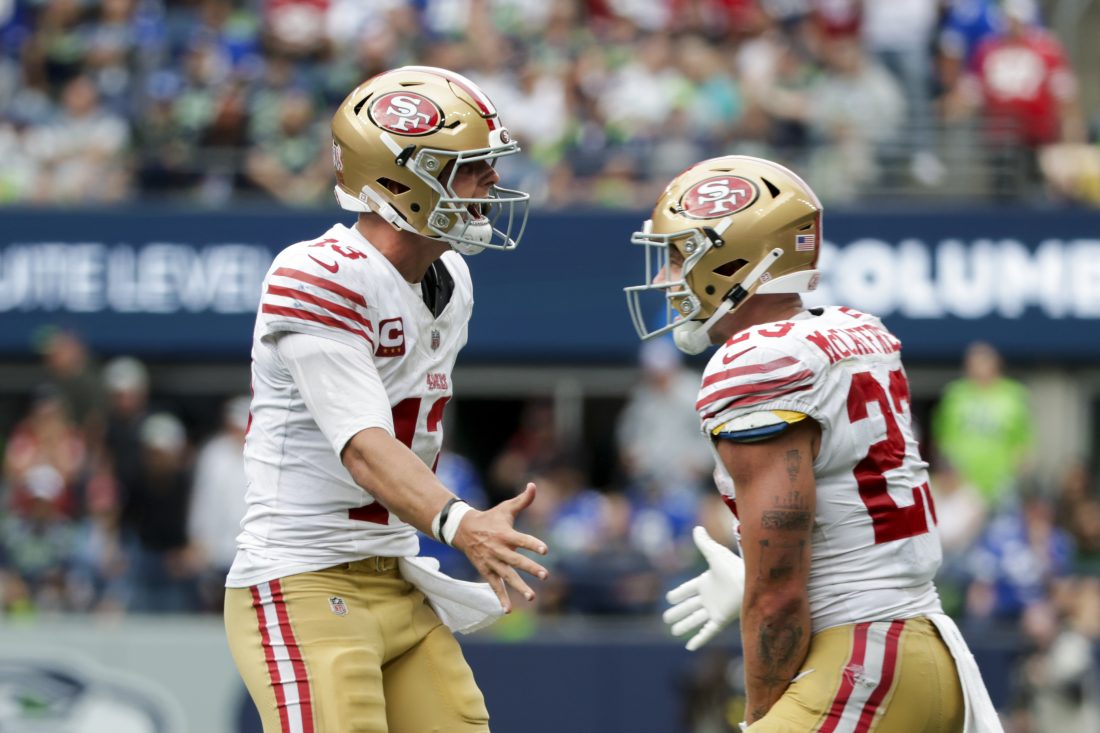 Sep 7, 2025; Seattle, Washington, USA; San Francisco 49ers quarterback Brock Purdy celebrates after throwing a touchdown pass against the Seattle Seahawks during the fourth quarter at Lumen Field. Mandatory Credit: Joe Nicholson-Imagn Images