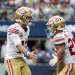 Sep 7, 2025; Seattle, Washington, USA; San Francisco 49ers quarterback Brock Purdy celebrates after throwing a touchdown pass against the Seattle Seahawks during the fourth quarter at Lumen Field. Mandatory Credit: Joe Nicholson-Imagn Images
