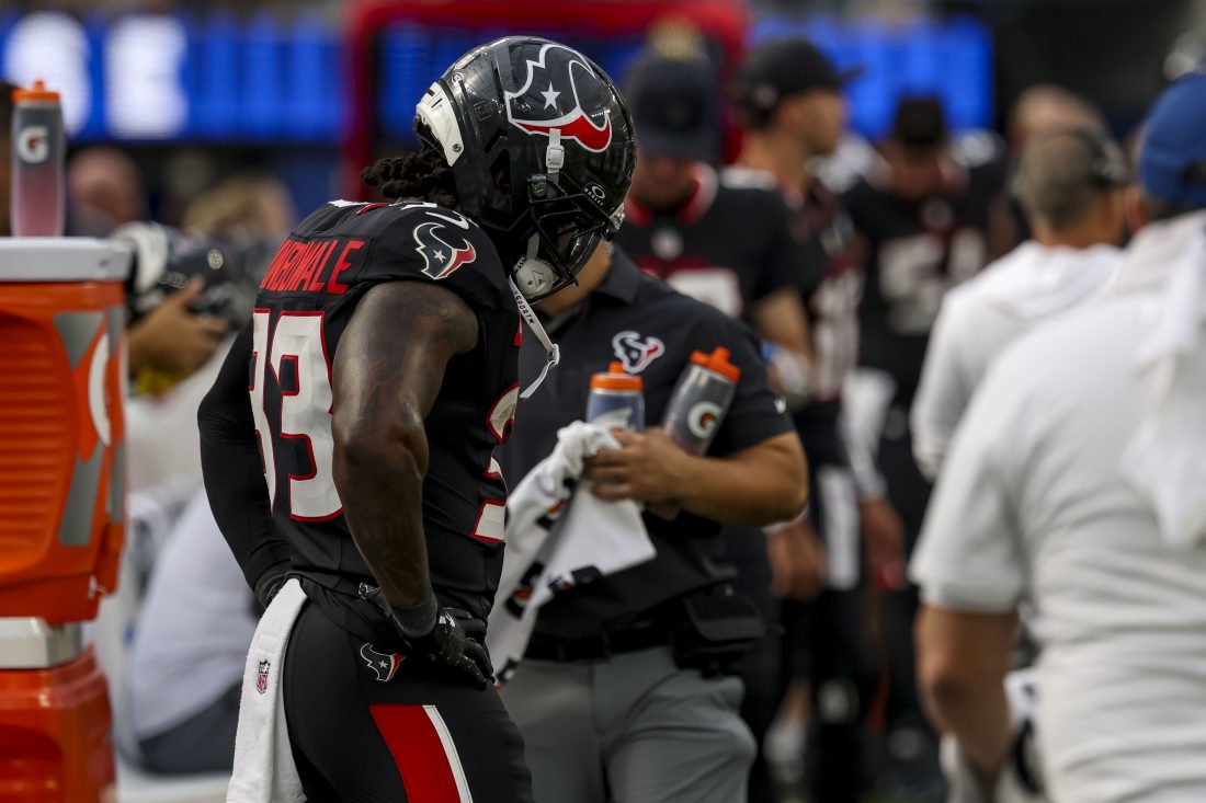 Sep 7, 2025; Inglewood, California, USA; Houston Texans running back Dare Ogunbowale (33) looks down on the sidelines after fumbling the ball during the fourth quarter at SoFi Stadium. Mandatory Credit: Kiyoshi Mio-Imagn Images