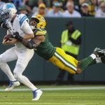 Sep 7, 2025; Green Bay, Wisconsin, USA; Green Bay Packers defensive end Micah Parsons (1) sacks Detroit Lions quarterback Jared Goff (16) during the second half at Lambeau Field. Mandatory Credit: Tork Mason-USA TODAY Network via Imagn Images