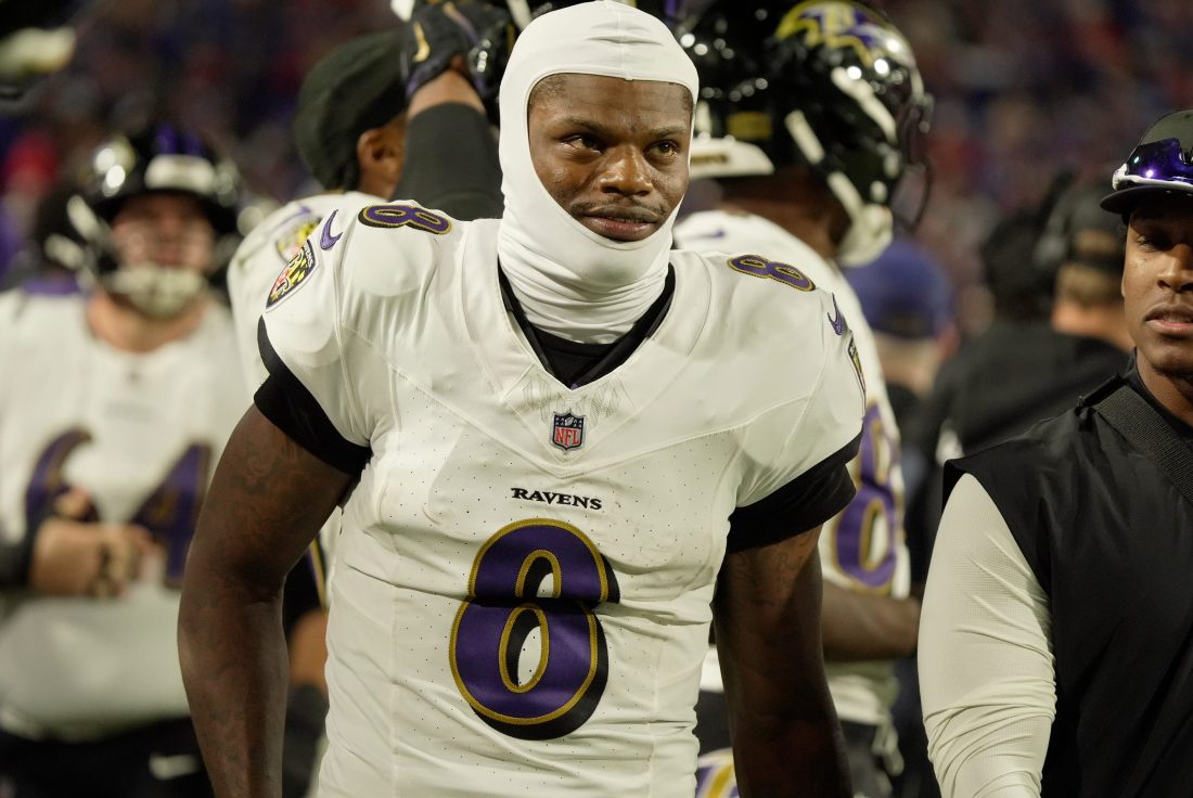 Baltimore Ravens quarterback Lamar Jackson gets ready to take the field during the second half of their game against the Baltimore Ravens at Highmark Stadium in Orchard Park on Sept. 7, 2025.