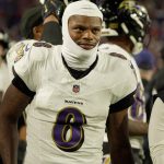 Baltimore Ravens quarterback Lamar Jackson gets ready to take the field during the second half of their game against the Baltimore Ravens at Highmark Stadium in Orchard Park on Sept. 7, 2025.