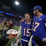 Buffalo Bills quarterback Josh Allen chats with Matt Prater who won the game with his field goal attempt. Prater received a Sunday Night football after the game at Highmark Stadium in Orchard Park on Sept. 7, 2025.